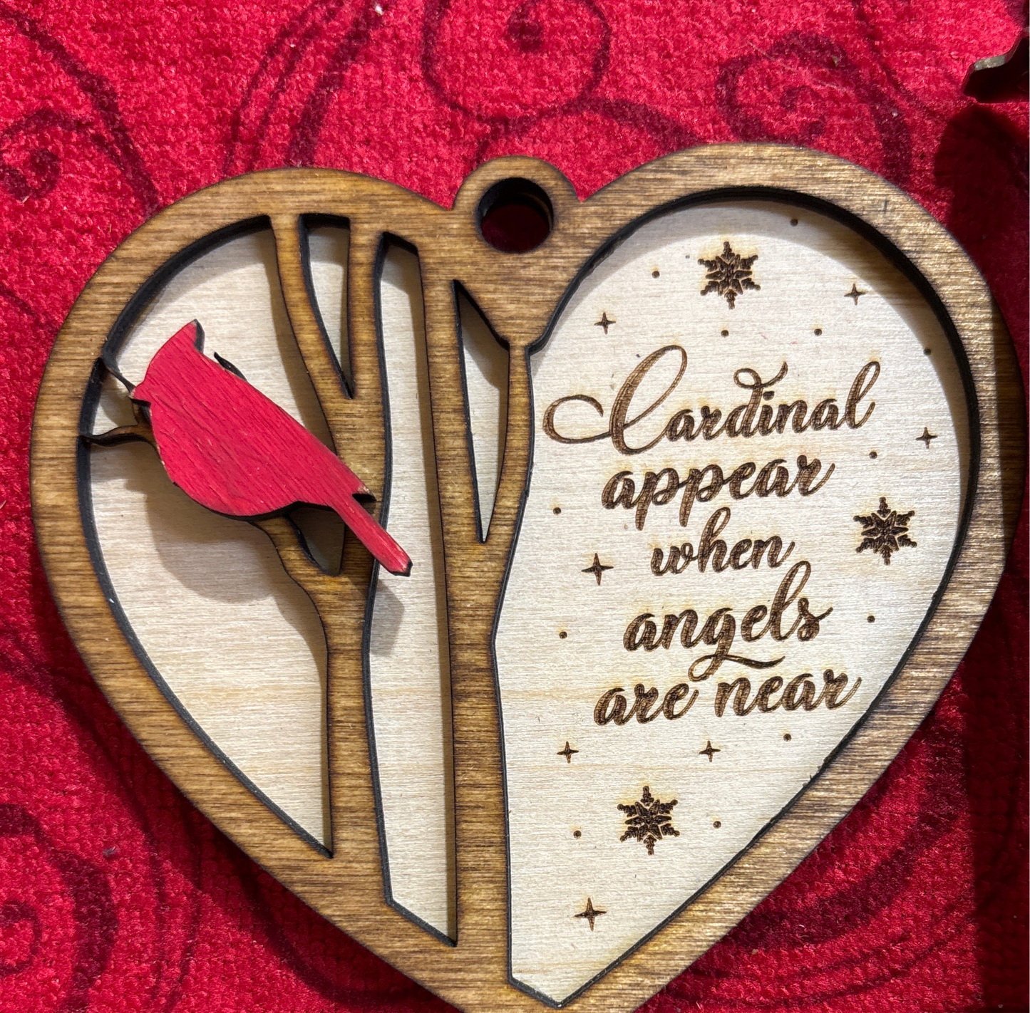 Cardinal appear when angels are near ornament